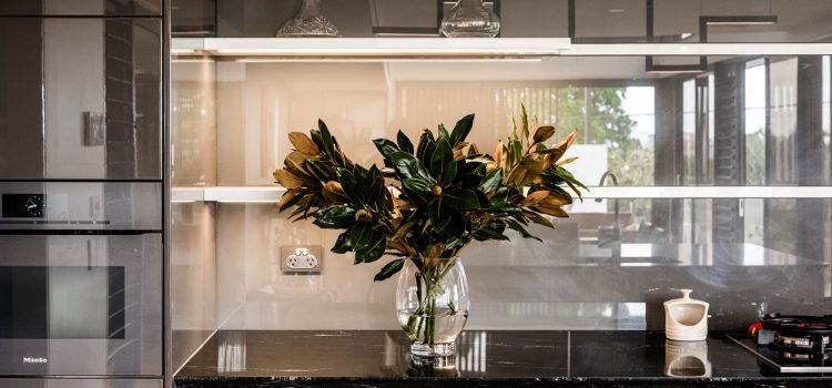 Feature book shelf with magnolia flowers